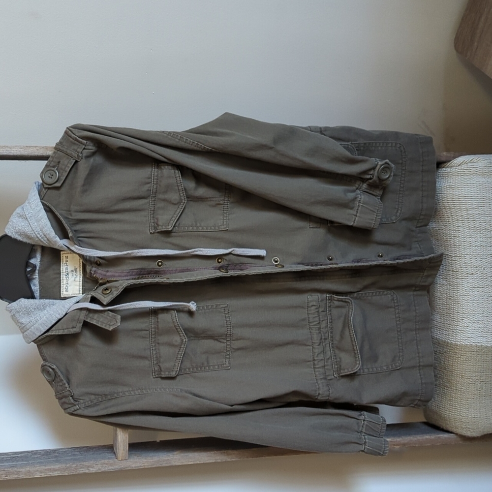 Casual light jacket. 100% cotton. Army green with cotton hood. Fits like medium.